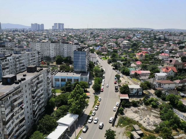 Вид из окна на застроенный город. Фото: Мир Квартир